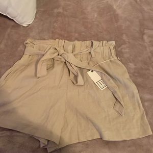 Khaki colors shorts.